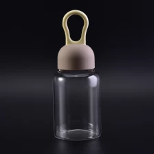 China Glas Wasserflasche mit Gummi-Deckel Hersteller