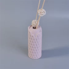 中国 ホームフレグランスのためのマットピンクの織りパターンセラミックアロマディフューザーボトル メーカー