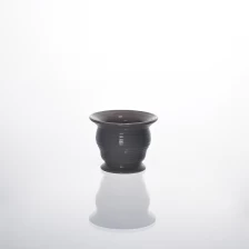 China Suporte de vela de cerâmica New esmalte de cor fabricante