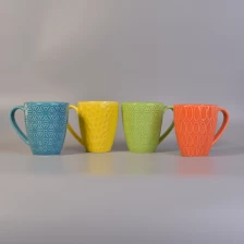 China Orange Großhandel Keramik Kerze Tasse mit Griff Hersteller