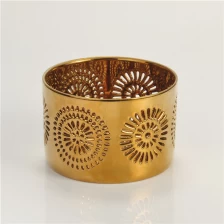 China Ouro de ala Oscar redondo hollo para fora do suporte de vela cerâmica fabricante