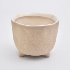 porcelana Envases de velas de cerámica con glaseado de durazno para 4 mechas fabricante