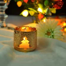 China Pierced christmas tree Golden candle holders manufacturer