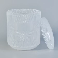 China Popular Embossed Glass Candle Jars With Lids manufacturer