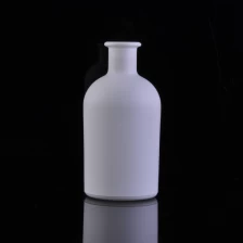 China Pure white color coating round glass aroma essencial bottle manufacturer