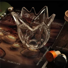 China Special shaped clear glass candle jar with lid manufacturer