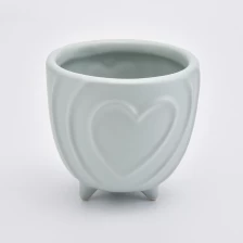 China Unique design with heart shape ceramic candle jar manufacturer