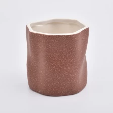China Unique shape ceramic candle holder with sanding surface finish manufacturer