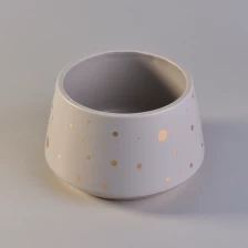 China Vaso de vela cerâmico de forma única com pontos de cor dourada fabricante