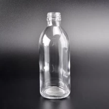 China Vintage transparent high round glass container perfume bottle wholesale manufacturer