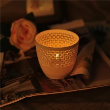 China Hollow Pattern Ceramic Candle Holder Wholesale manufacturer