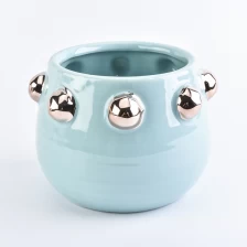 China Glänzend blau glasiertes Keramikkerzenglas mit Hobnail Hersteller