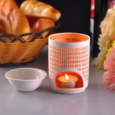 Chiny hollow design ceramic vigil lamp candle holder producent
