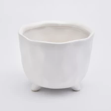 Cina portacandele in ceramica bianco opaco con piedini produttore
