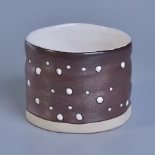 China metal glaze ceramic candle jar with hand drawing manufacturer