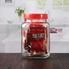 China 1.5 liter 1500 ml big storage jars empty square glass jars with red plastic lid manufacturer