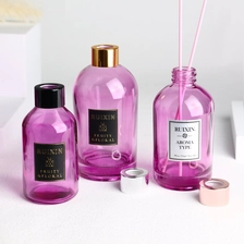 China Round Purple Diffuser Bottles with Labels, Caps, and Screw Neck manufacturer