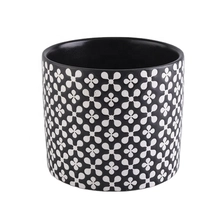 China matte black ceramic jars with debossed designs for candle manufacturer