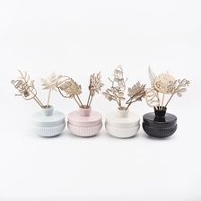 China pearl pink ceramic diffuser bottle, empty aroma diffuser bottles manufacturer