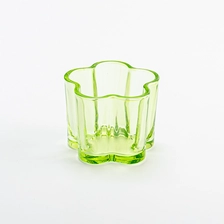 China Wholesale 140ml transparent green color glass candle vessel for home decor manufacturer