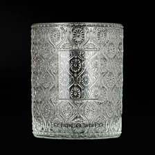 China Luxury Embossed Floral Patterns Glass Scented Candle Jar for Home Decor manufacturer
