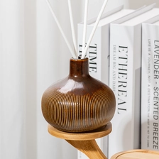 China Brown Color Stripe Finish Ceramic Bottle 320ml Reed Diffuser Bottle Manufacturer manufacturer