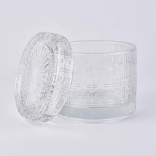 China Clear glass candle jars with lid for home decor manufacturer
