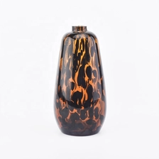 China 410ml luxury colorful overlay glass diffuser bottle for home decor manufacturer