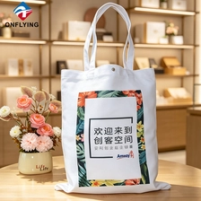 China Individuelles Logo Langlebige hochwertige Handtasche Einkaufstasche aus Segeltuch Ladenpräsentation Fabrik China Hersteller