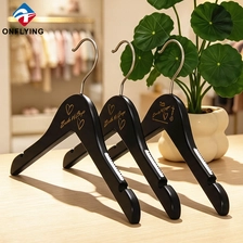 中国 High-end Luxurious Wood Solid Smooth Garment Kid Wooden Beige Hanger Custom logo Factory China - COPY - cuva6l 制造商