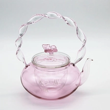 Chine Théière rose à haute teneur en borosilicate avec poignée en spirale et infuseur en verre fabricant
