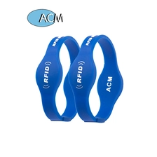 Cina Gelang Kontrol Akses Konser OEM Ramah Lingkungan LF HF UHF Tali Gelang Silikon RFID Pasif Chip Ganda pabrikan