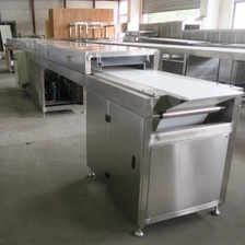 porcelana Fábrica de túneles de enfriamiento de bocadillos de chocolate completamente automática de China fabricante