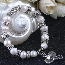 China Elephant Pendant 10mm White Pearl Alloy Bracelet Supplier China manufacturer