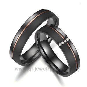 China Customizable Matte Black Titanium Wedding Bands with Rose Gold Groove & Stone Setting manufacturer