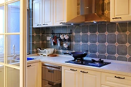 Is tile grouting under the cabinet?