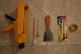 What tools do beginners need to grouting
