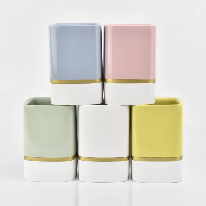 white rectangle concrete candle jars