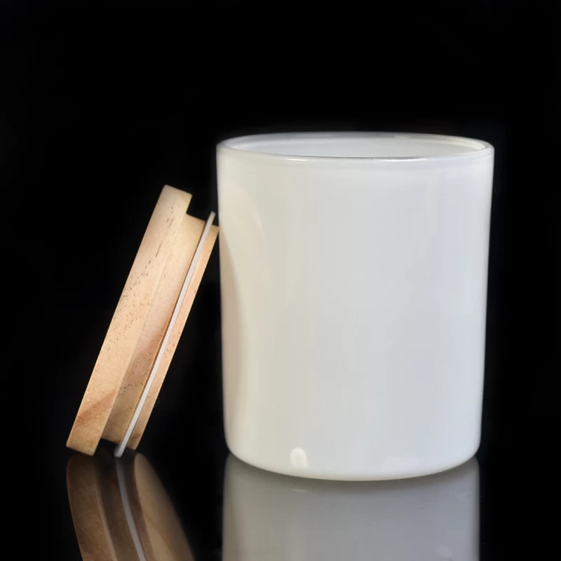 white glass candle holder with wood lid