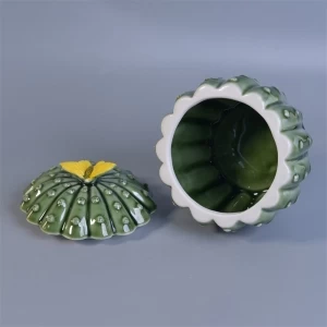 Dekorativer Kaktuskeramikkerzenhalter mit Deckel