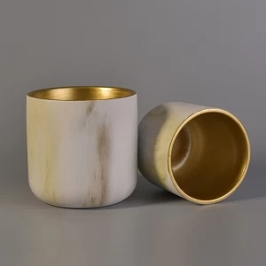 Transfer printing  ceramic candle containers with gold painting