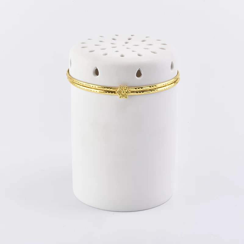 white ceramic candle jar with hollow out lid 