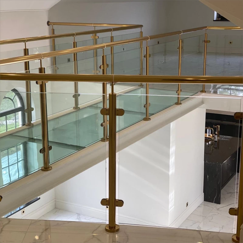 Luxurious golden glass railing for your home glass railing project