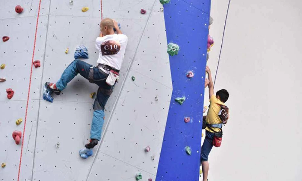 What are the construction materials of rock climbing walls?