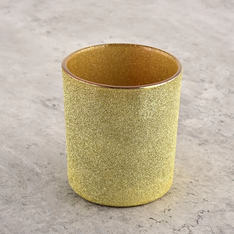 Golden glass tumblers for candles for home decoration