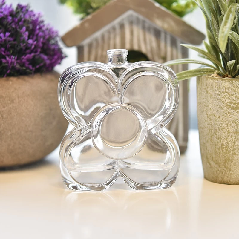 Transparency butterfly-shape glass vessel double wall perfume bottle supplier