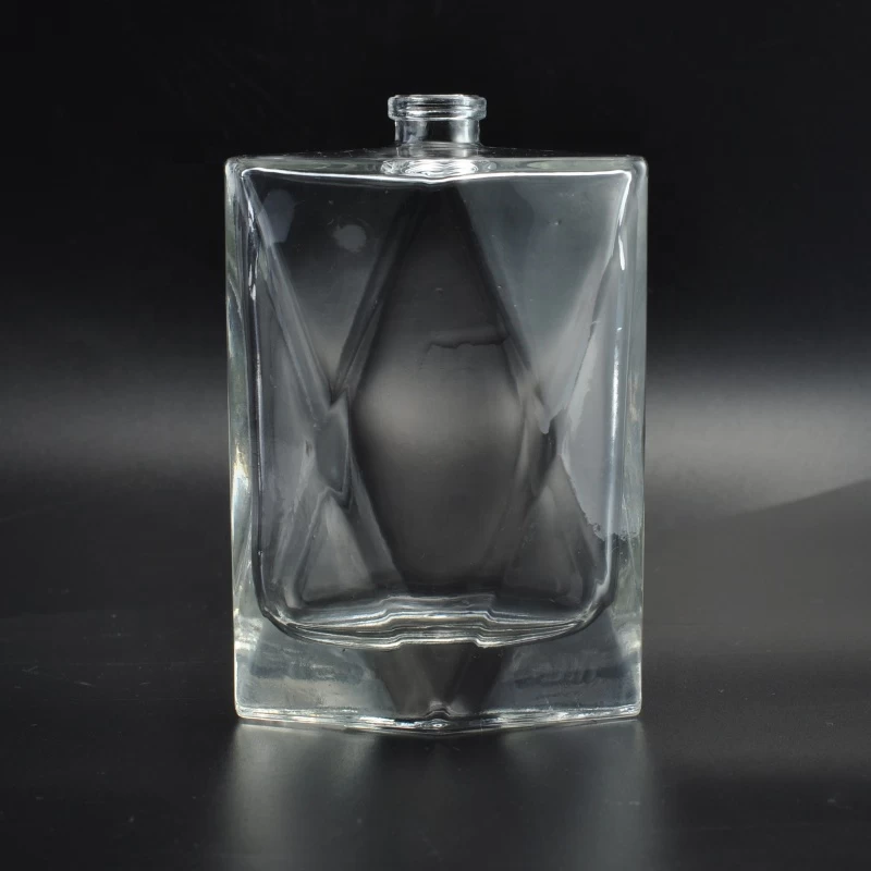 Empty embossed perfume fragrance oil bottle