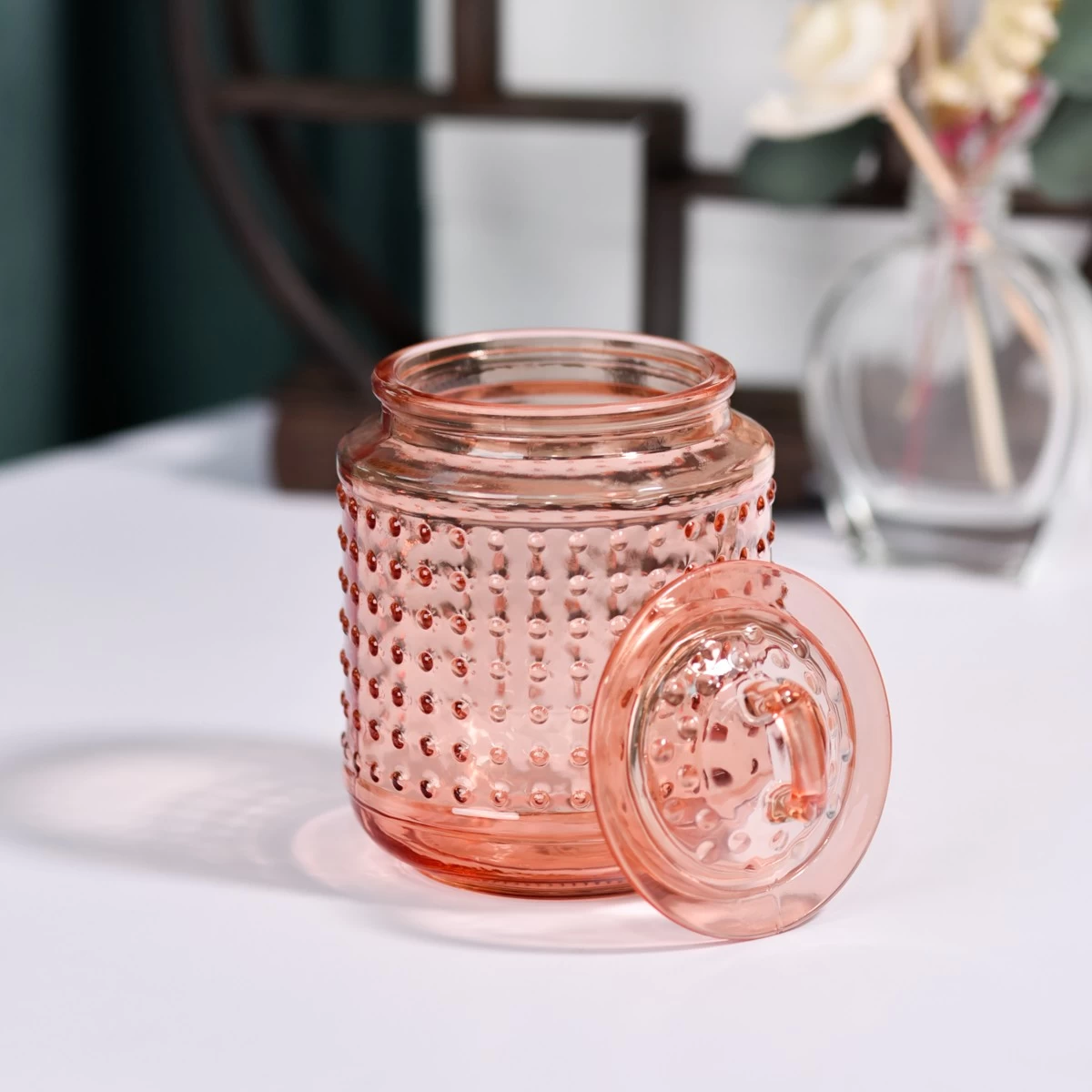 Pasadyang orange spot glass candle jar na may lids wholesaler