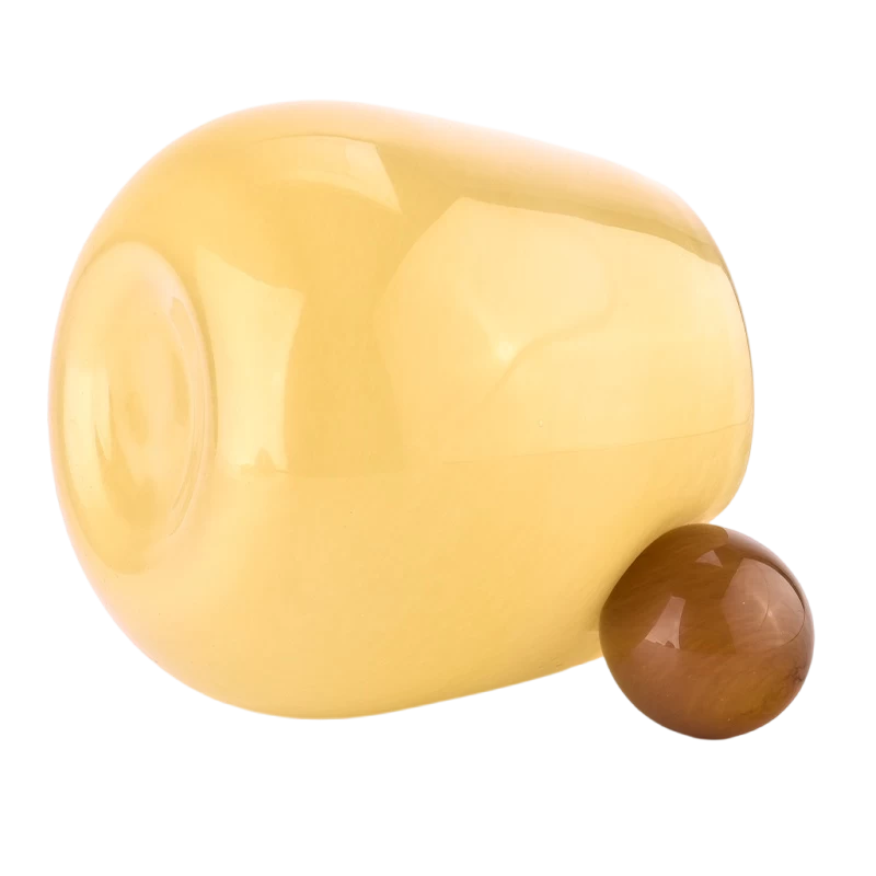 China Wholesale yellow glass candle holder with ball handle candle containers manufacturer