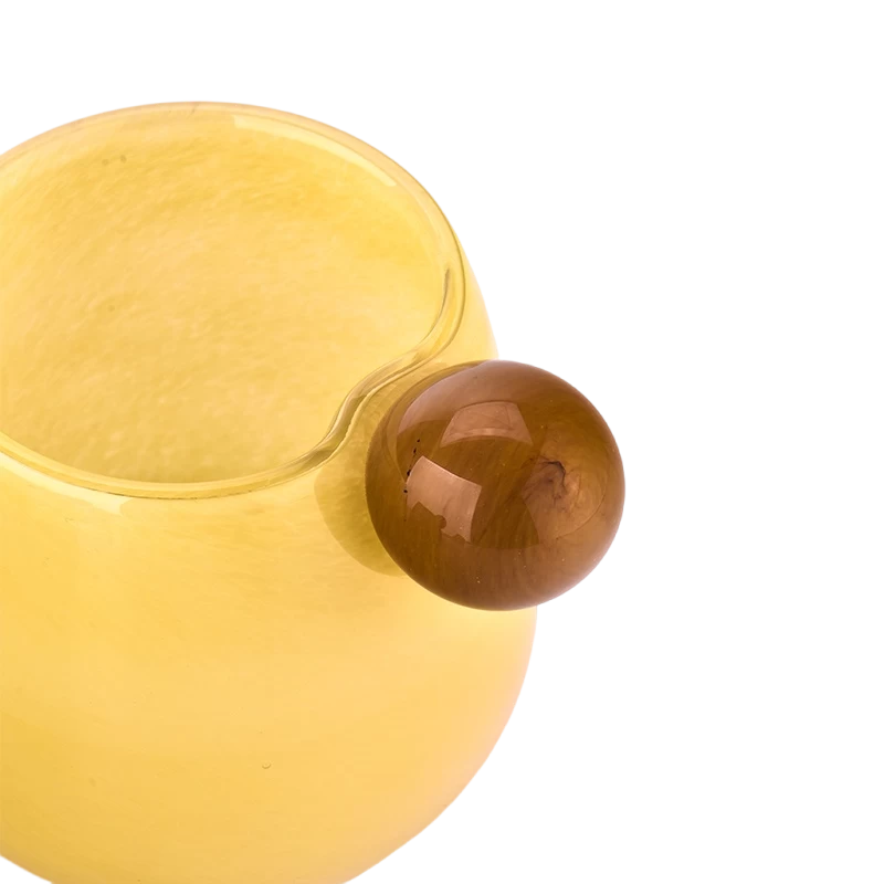 China Wholesale yellow glass candle holder with ball handle candle containers manufacturer